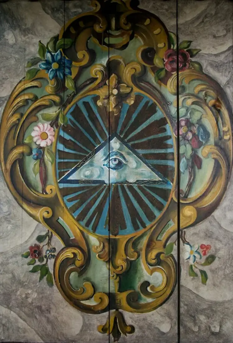 Tafelbild - ein Auge Gottes mit Lichtstraheln und Blumenkranz auf Holz gemalt