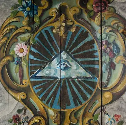 Tafelbild - ein Auge Gottes mit Lichtstraheln und Blumenkranz auf Holz gemalt